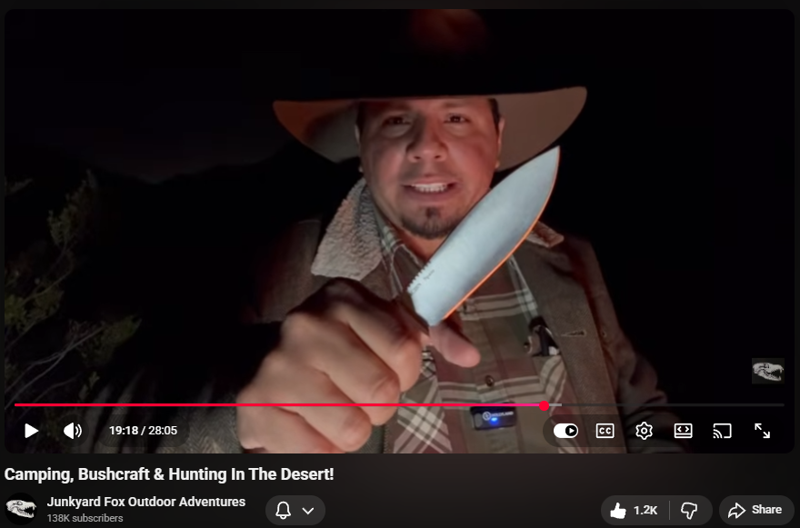 Junkyard Fox Prepares Dinner Over a Campfire with His Hunter 5